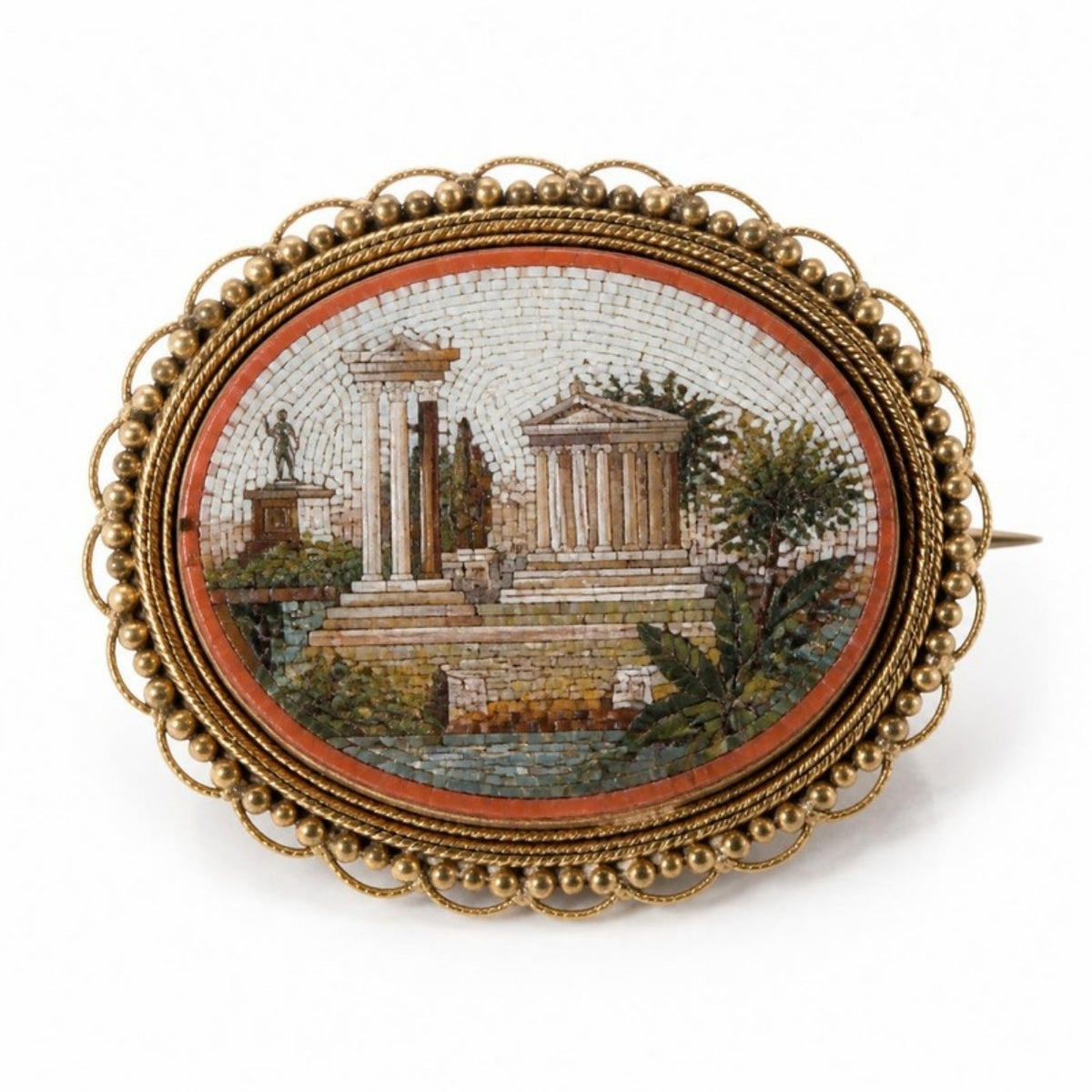 Oval micromosaic brooch showing Roman temple ruins in tiny glass tesserae, set in a beaded gold-tone frame