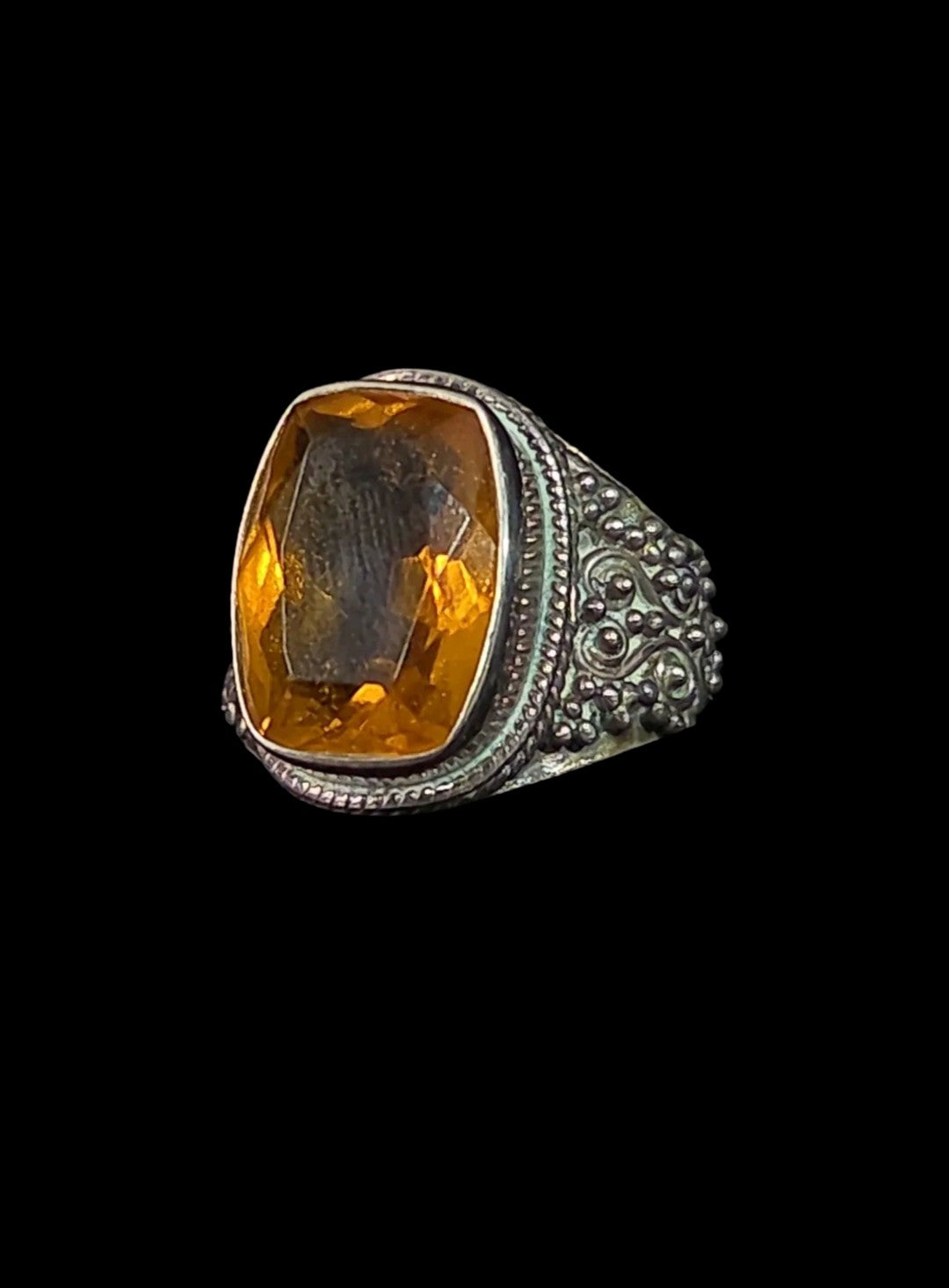 Vintage ornate sterling silver statement ring with a large golden stone
