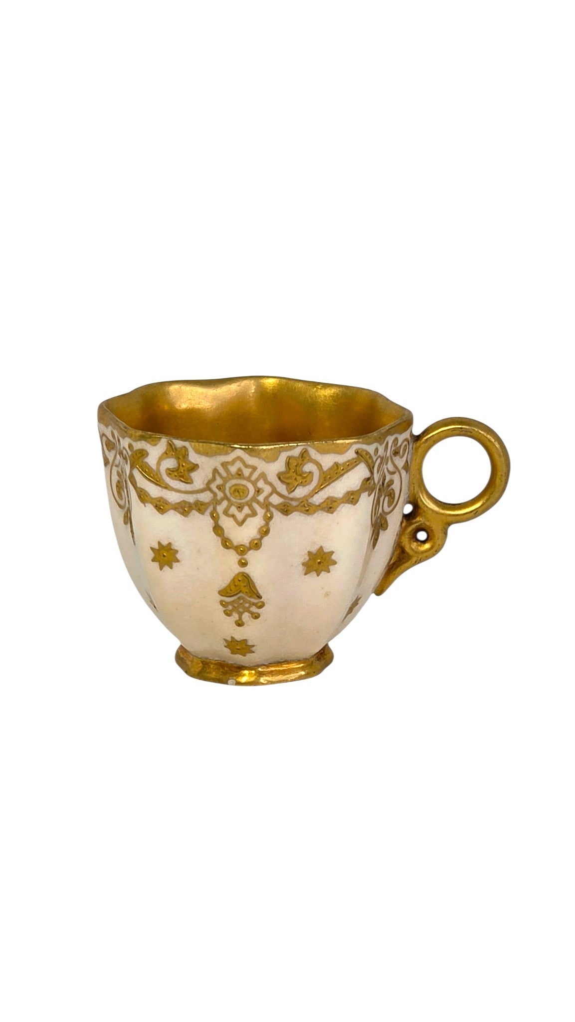 Antique Coalport demitasse cup with raised gold garlands and stars on ivory, from Oddly Darling Vintage