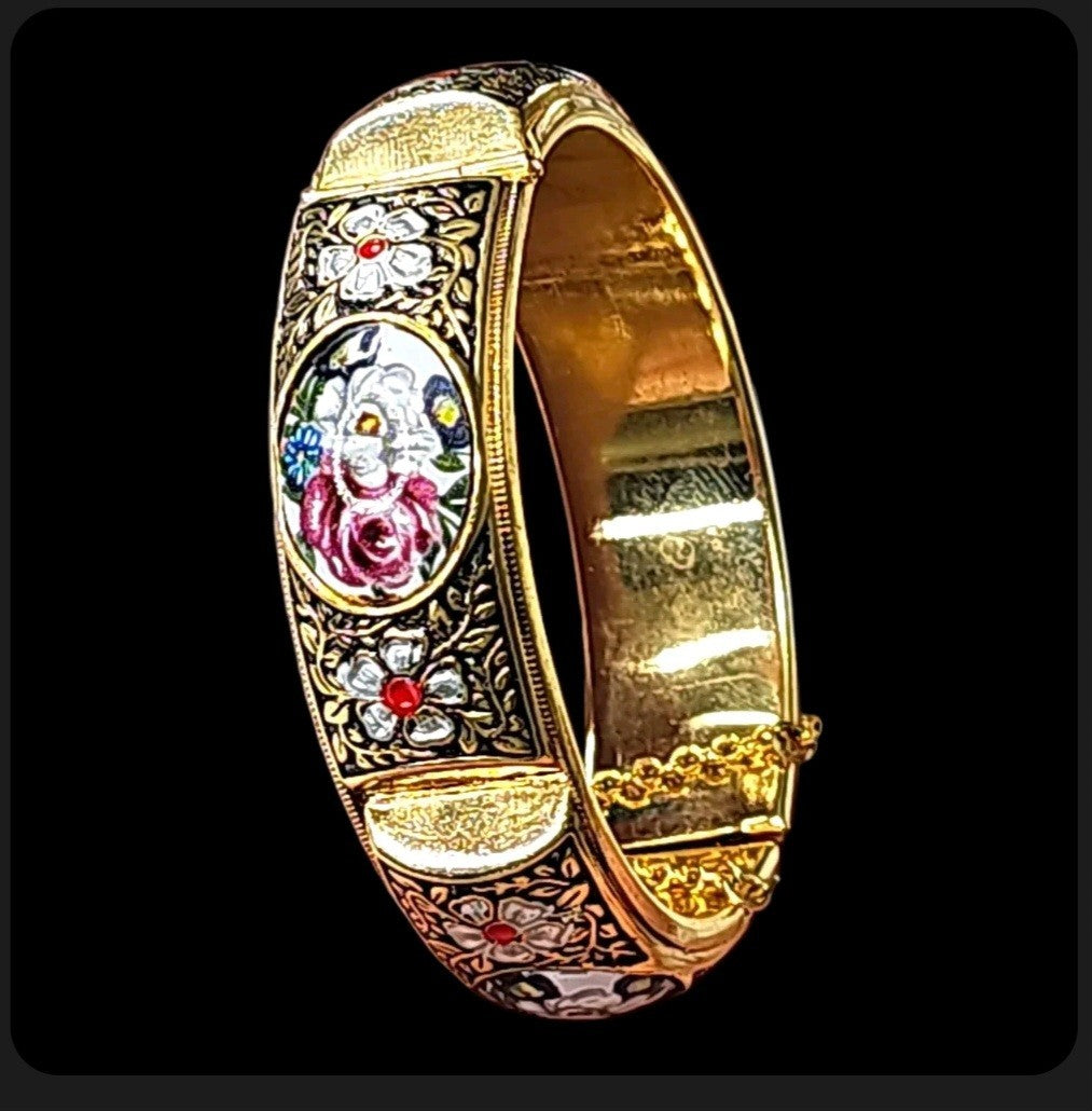 Vintage damascene style hinged bangle with enamel rose panels in black and gold-tone