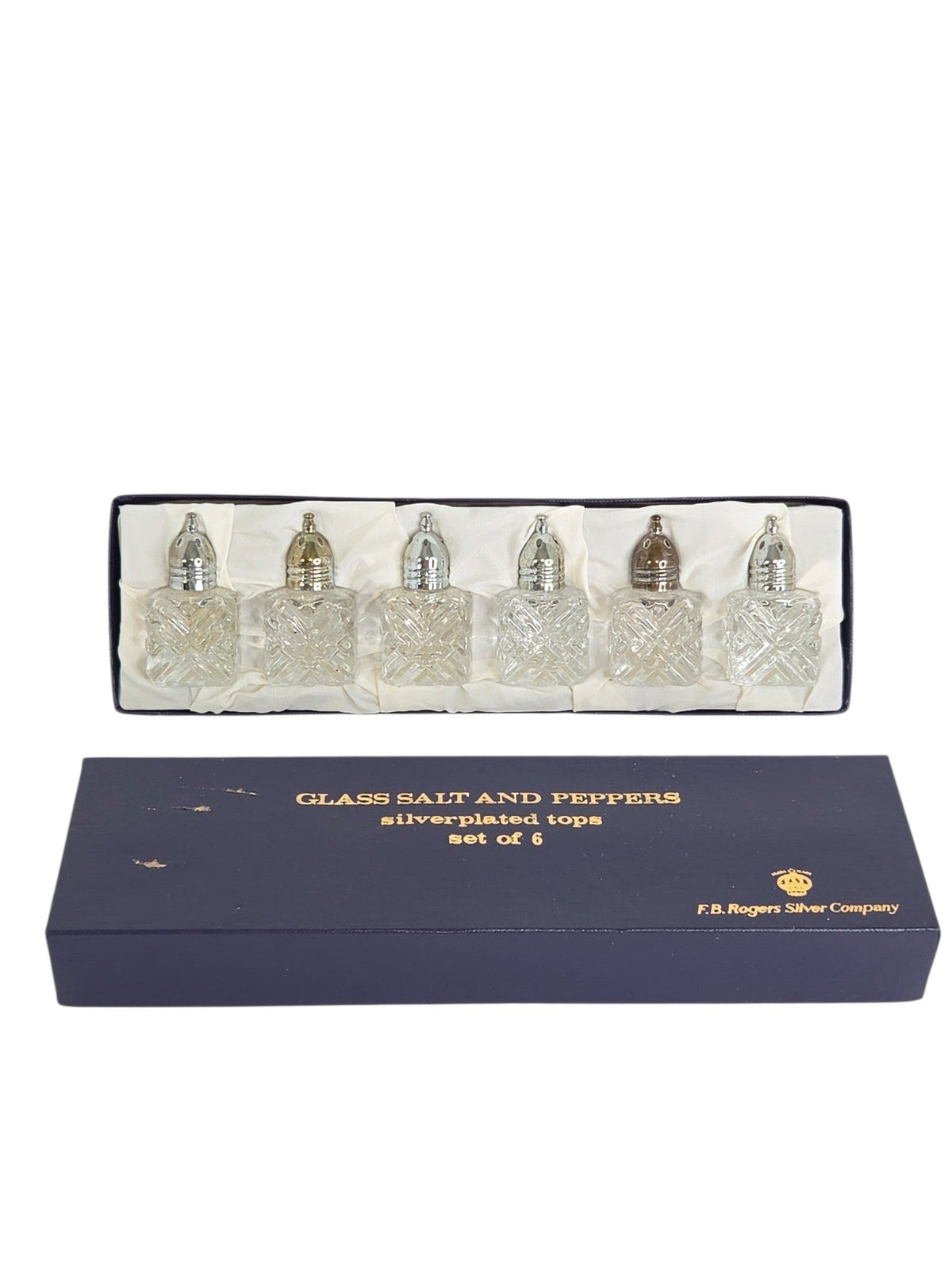 Vintage F.B. Rogers pressed glass salt and pepper shakers in original box