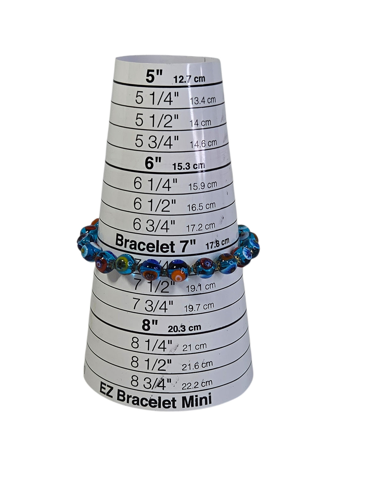 Murano style millefiori bead bracelet on a bracelet sizing cone, fitting about 7 to 7 1/4 inches