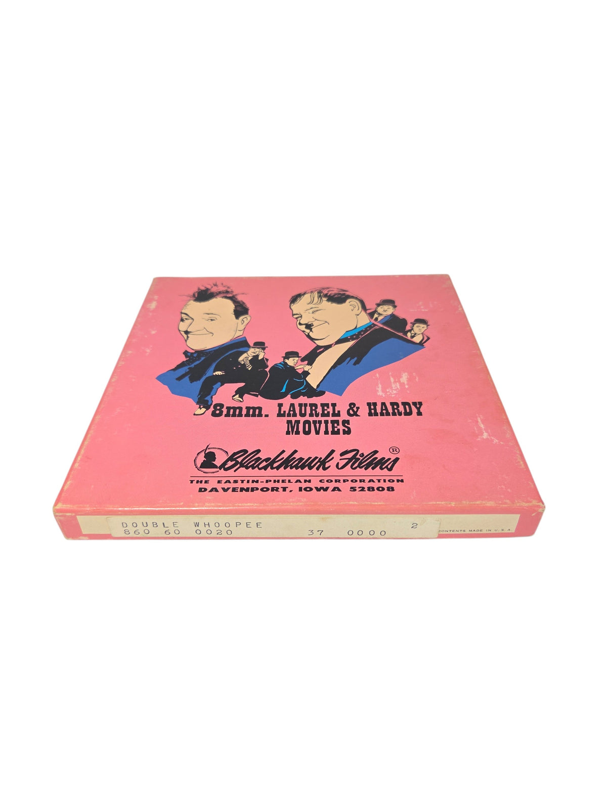 Pink Blackhawk Films 8mm Laurel & Hardy Movies box labeled Double Whoopee, with scuffs and edge wear