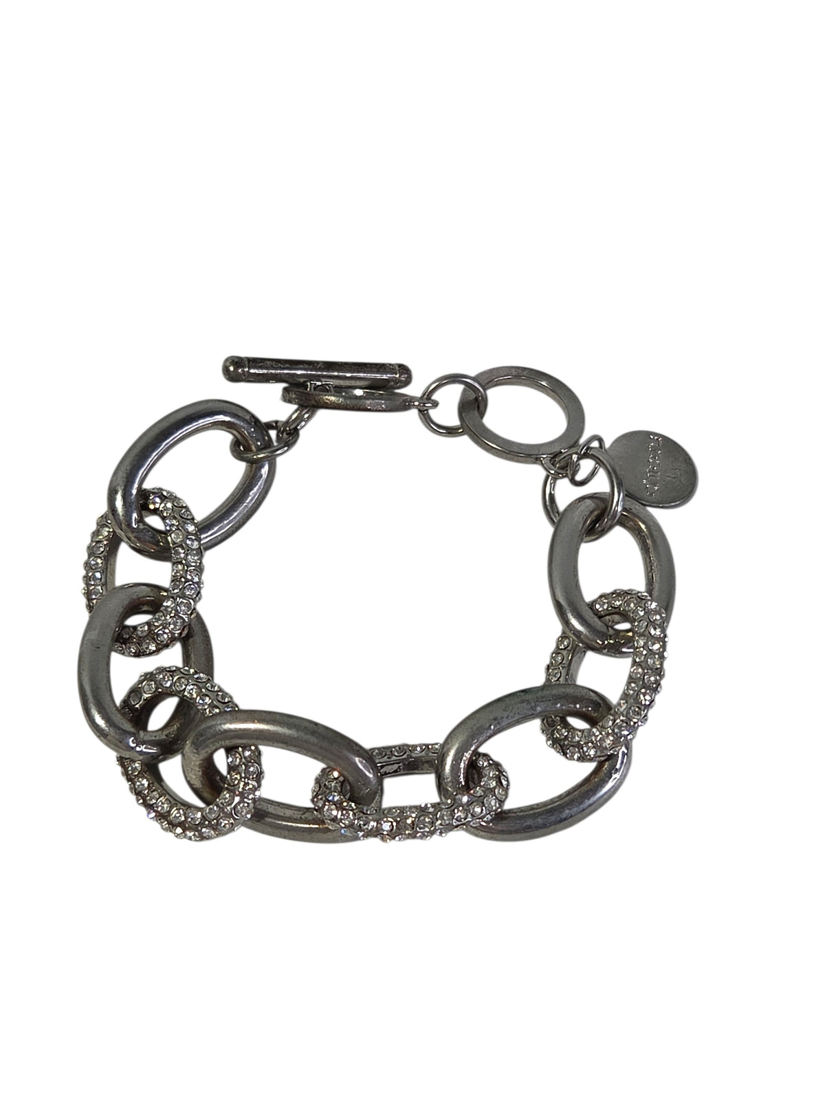 Chico's chunky silver-tone link bracelet on white, alternating plain oval links and crystal pave links with toggle clasp