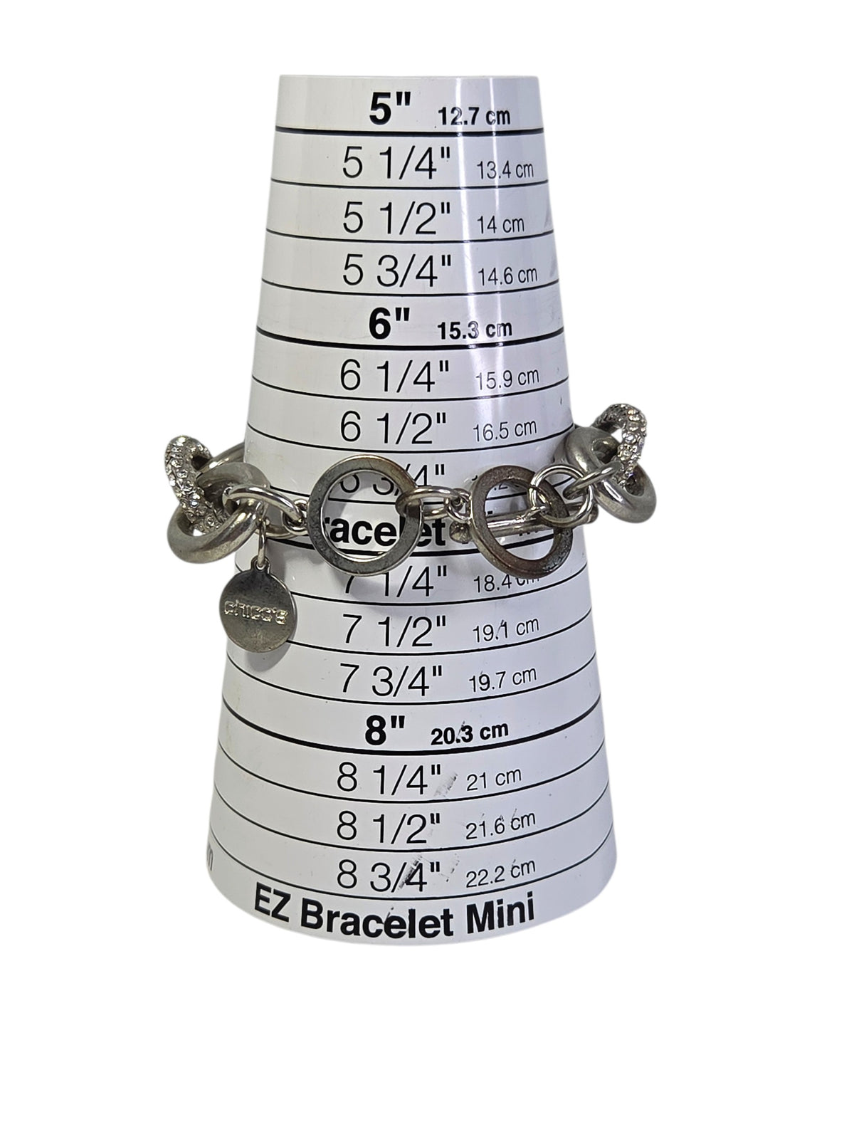 Chico's chunky link bracelet laid flat showing all eight links, both clasp rings and the logo tag