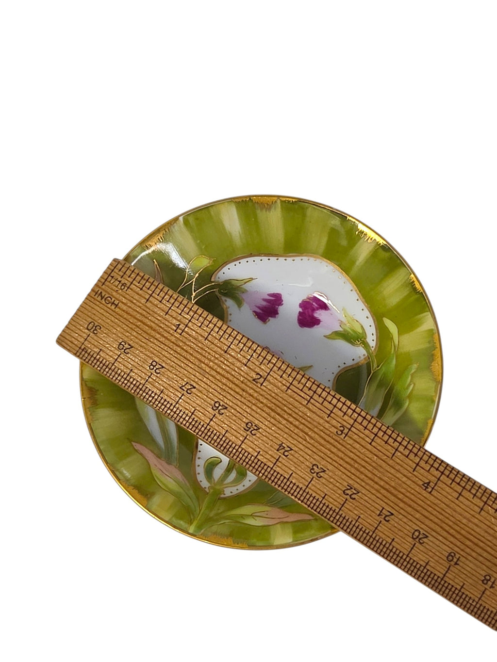 Art Nouveau porcelain dish with a ruler, about 3 1/4 inches across