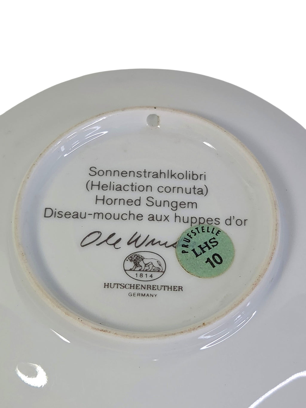 Close-up of the Hutschenreuther Germany 1814 lion mark, Horned Sungem name and green Pruefstelle LHS 10 sticker