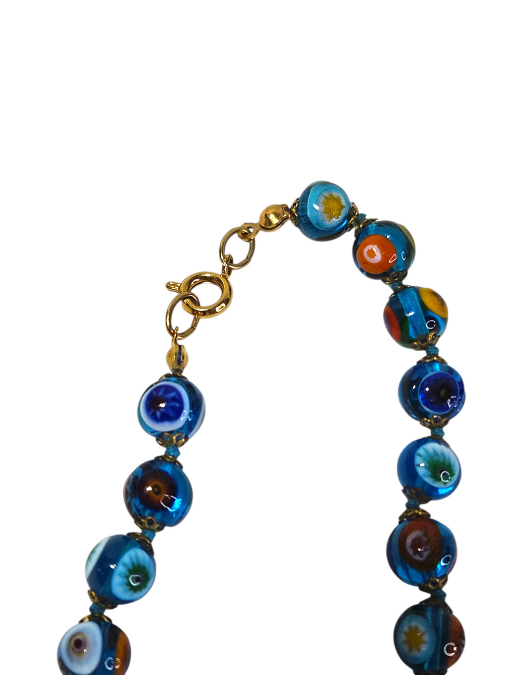 Close-up of the gold-tone spring ring clasp, jump ring and bead tips on the millefiori bracelet