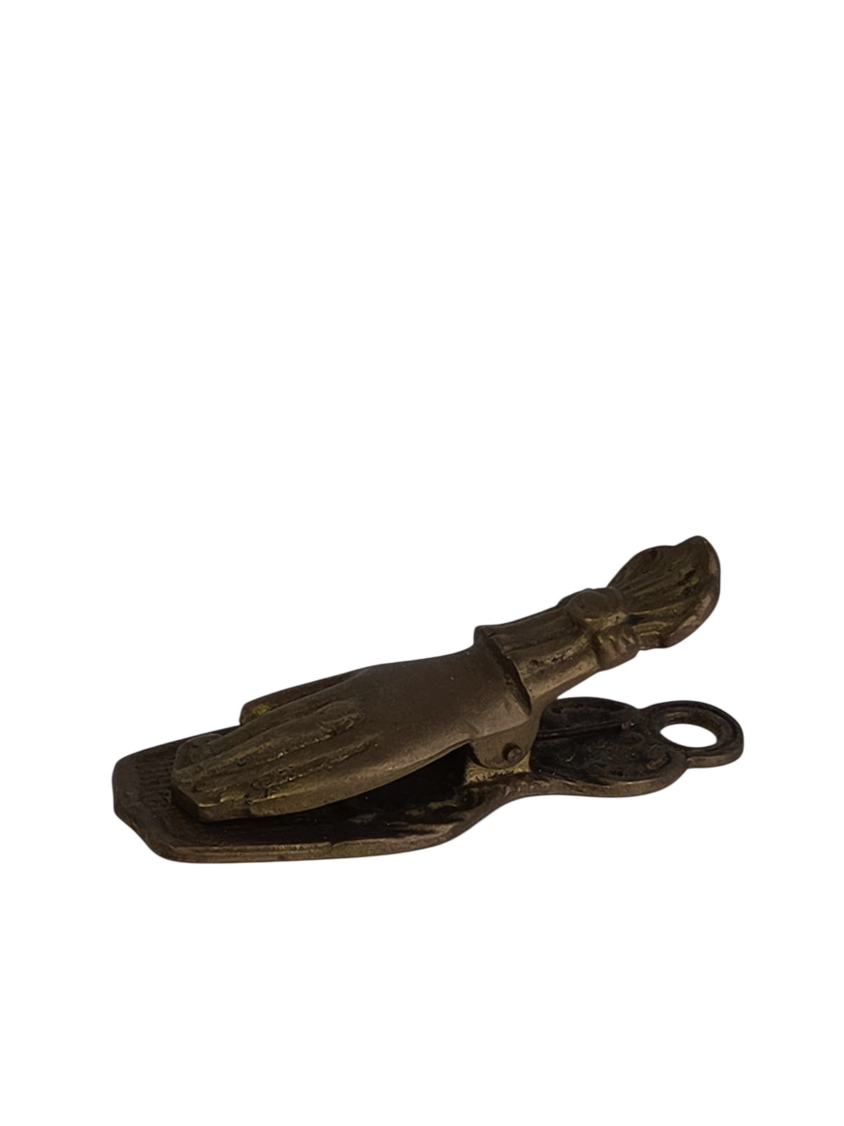 End view of the brass hand clip showing the spring and the hanging loop on the back plate