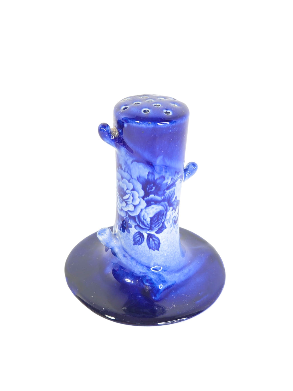 Side of the hatpin holder with three branch stubs, mottled white trunk and cobalt leaves