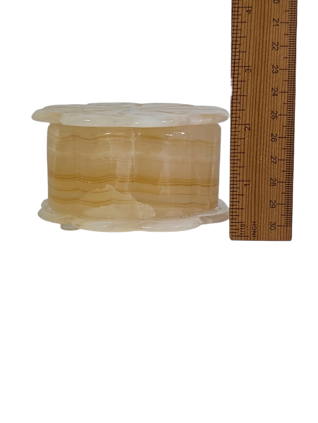 Onyx flower trinket box beside a ruler, about 2 1/4 inches tall