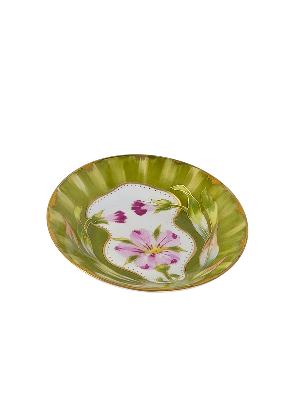 Art Nouveau porcelain dish at an angle, showing gold-outlined leaves and the gilded rim