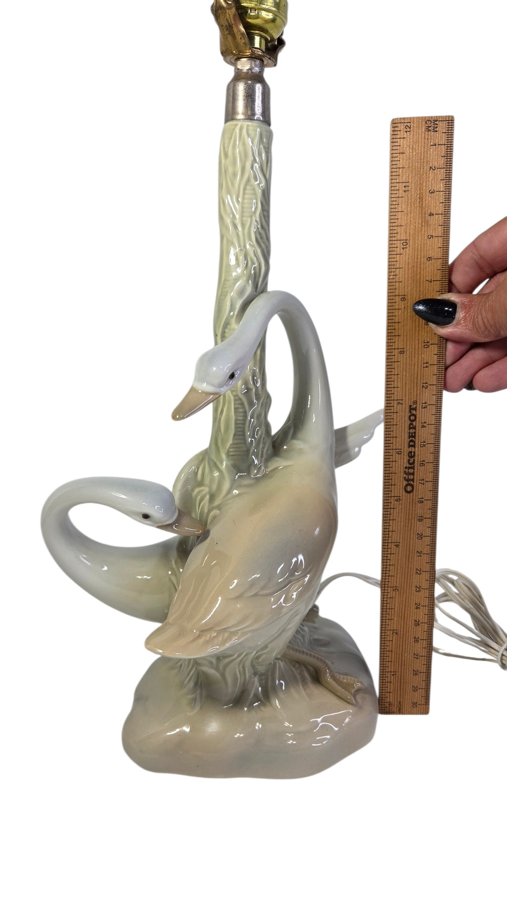Porceval porcelain swan lamp beside a ruler, about 11 inches to the socket collar