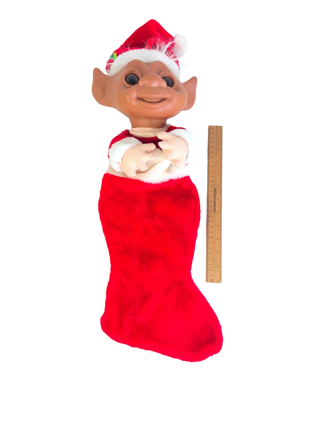Vintage Smithy troll Christmas stocking beside a ruler for size