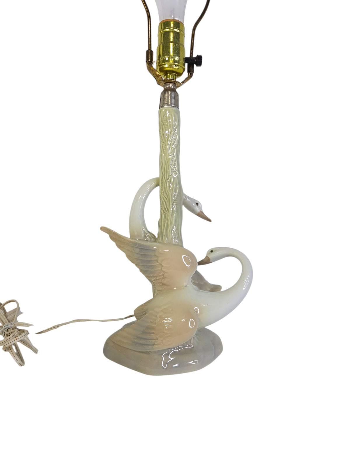 Back of the Porceval swan lamp with the lower swan's sculpted spread wings and curled neck