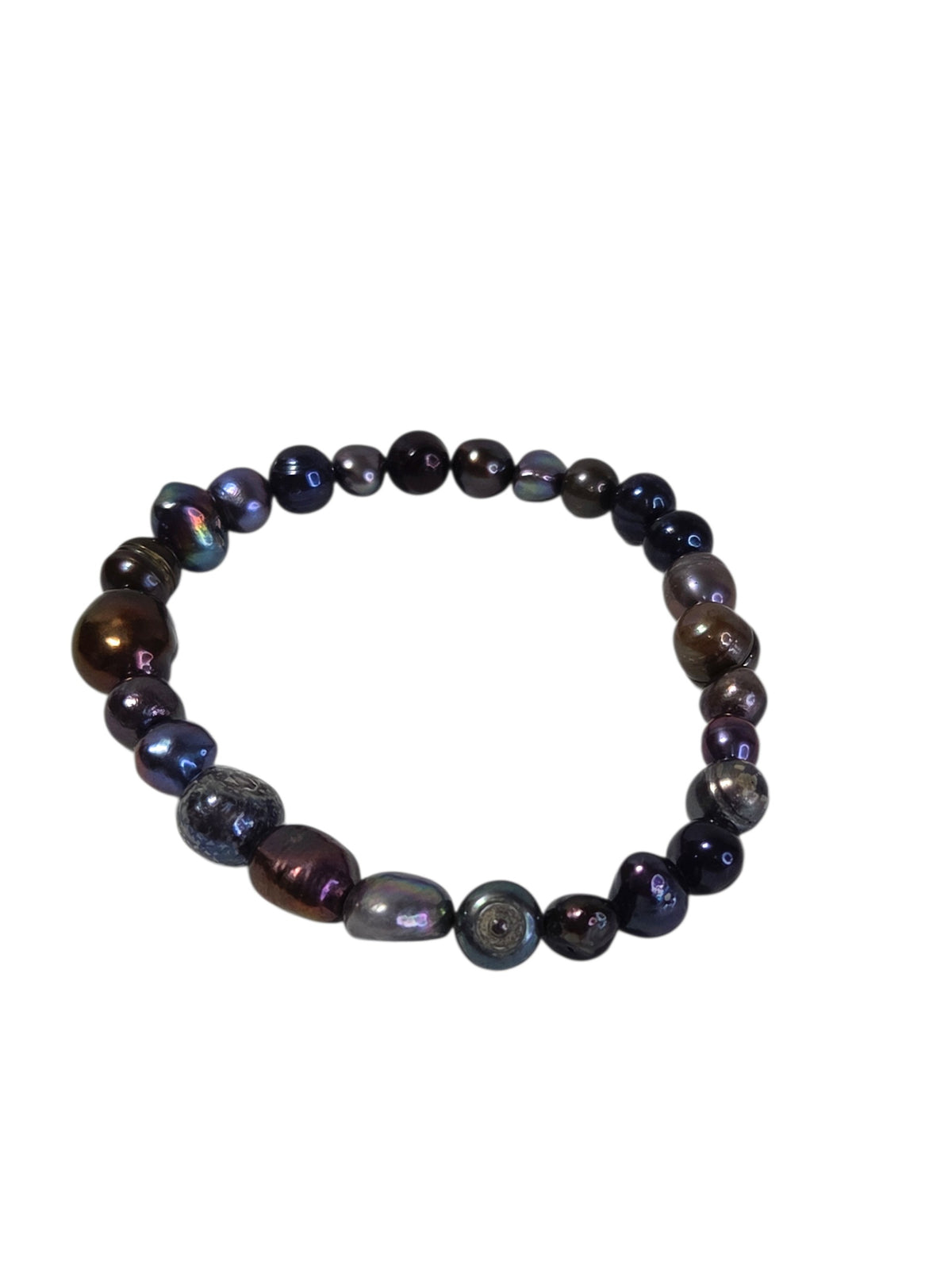 Close view of the black, purple and bronze freshwater pearls with natural ridges and rings