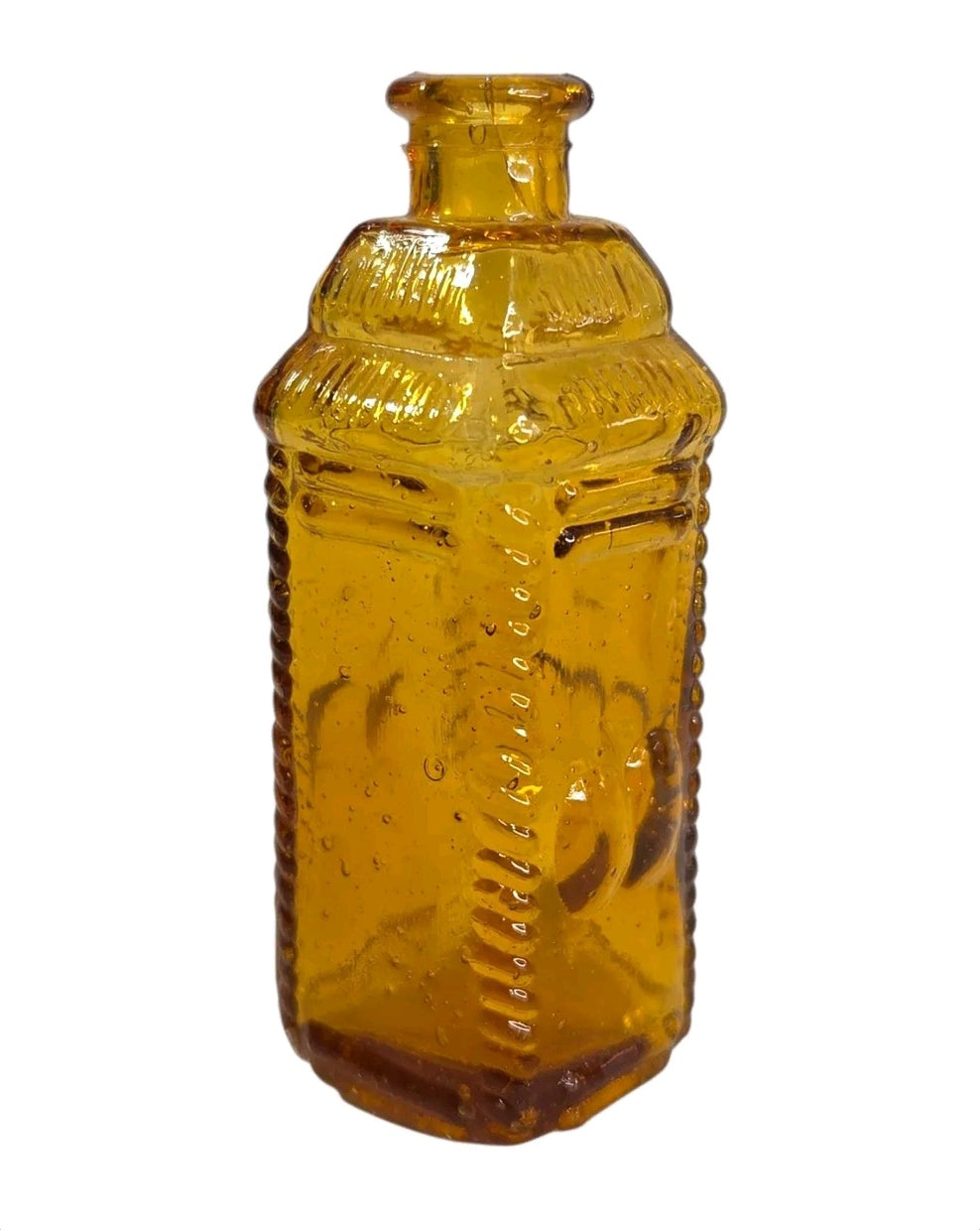 Oddly Darling Vintage miniature amber glass apothecary bottle with square shape and textured edges.