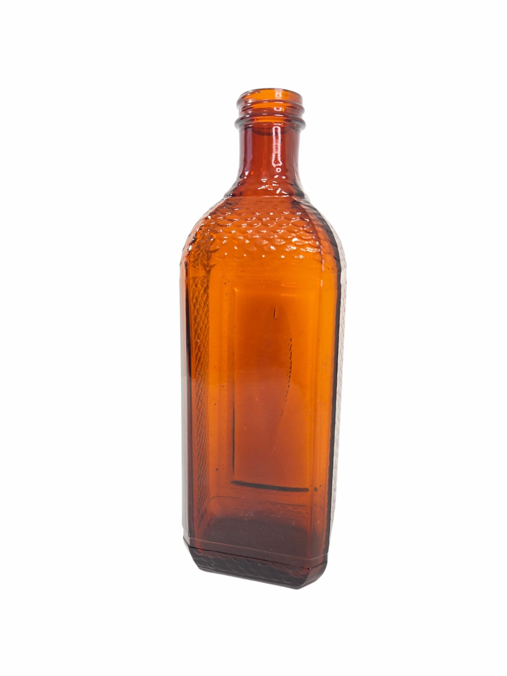 Oddly Darling Vintage amber glass bottle with embossed fish motif and textured scale sides for coastal home decor.