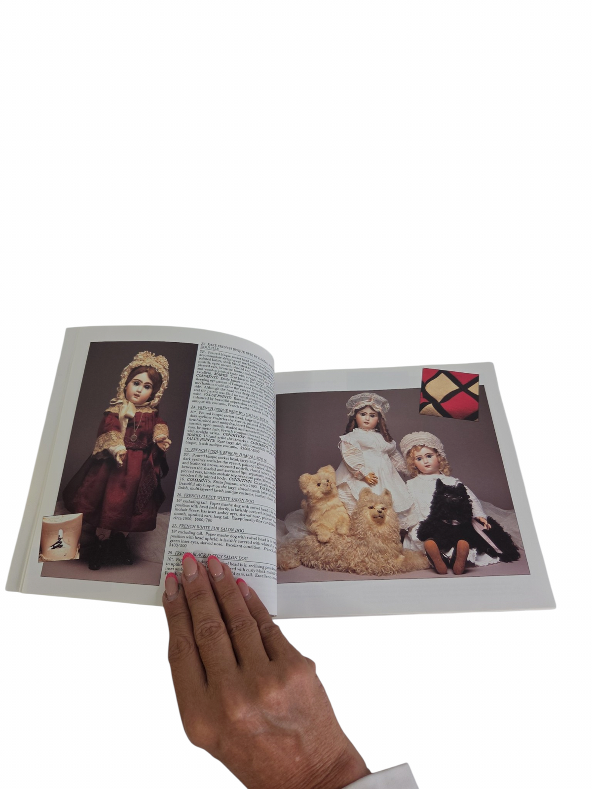 Oddly Darling Vintage Theriault's 1994 antique doll auction catalogue open to pages showing bisque dolls and toys.