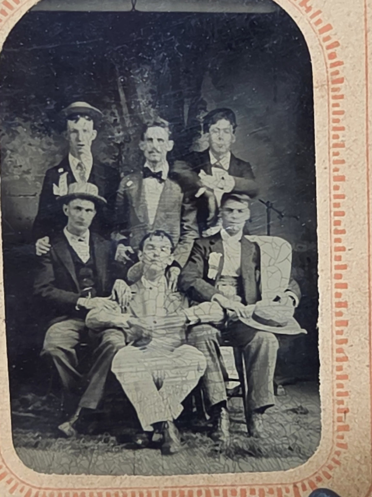Oddly Darling Vintage tintype of six young men in suits and boater hats with lapel ribbons