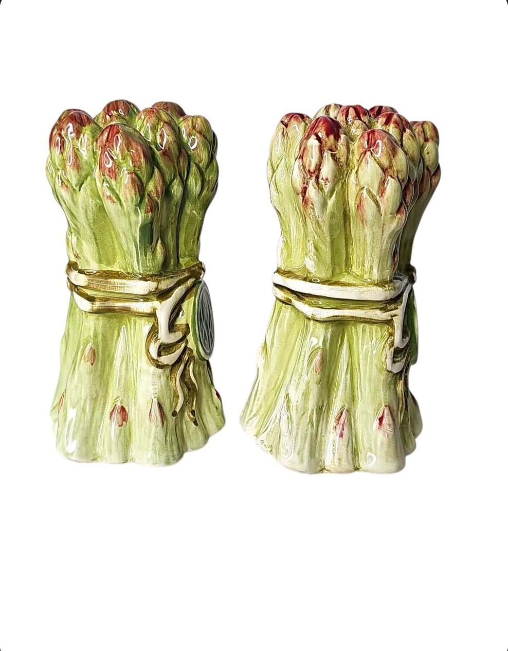 Oddly Darling Vintage ceramic salt and pepper shakers shaped like bundles of green asparagus with decorative ribbons.