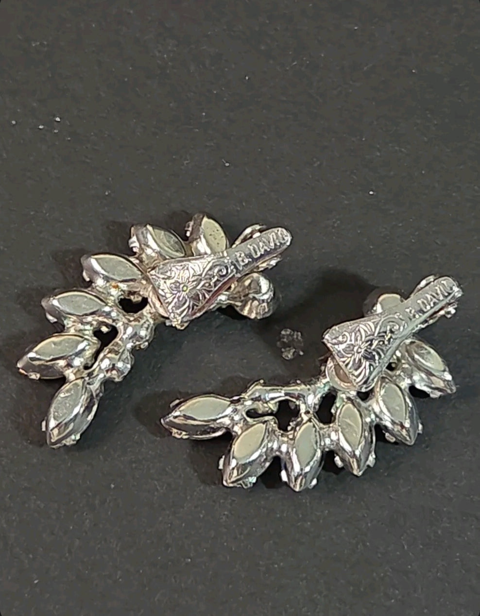 Oddly Darling Vintage B. David clip-on ear climber earrings featuring blue marquise rhinestones in silver-tone metal.