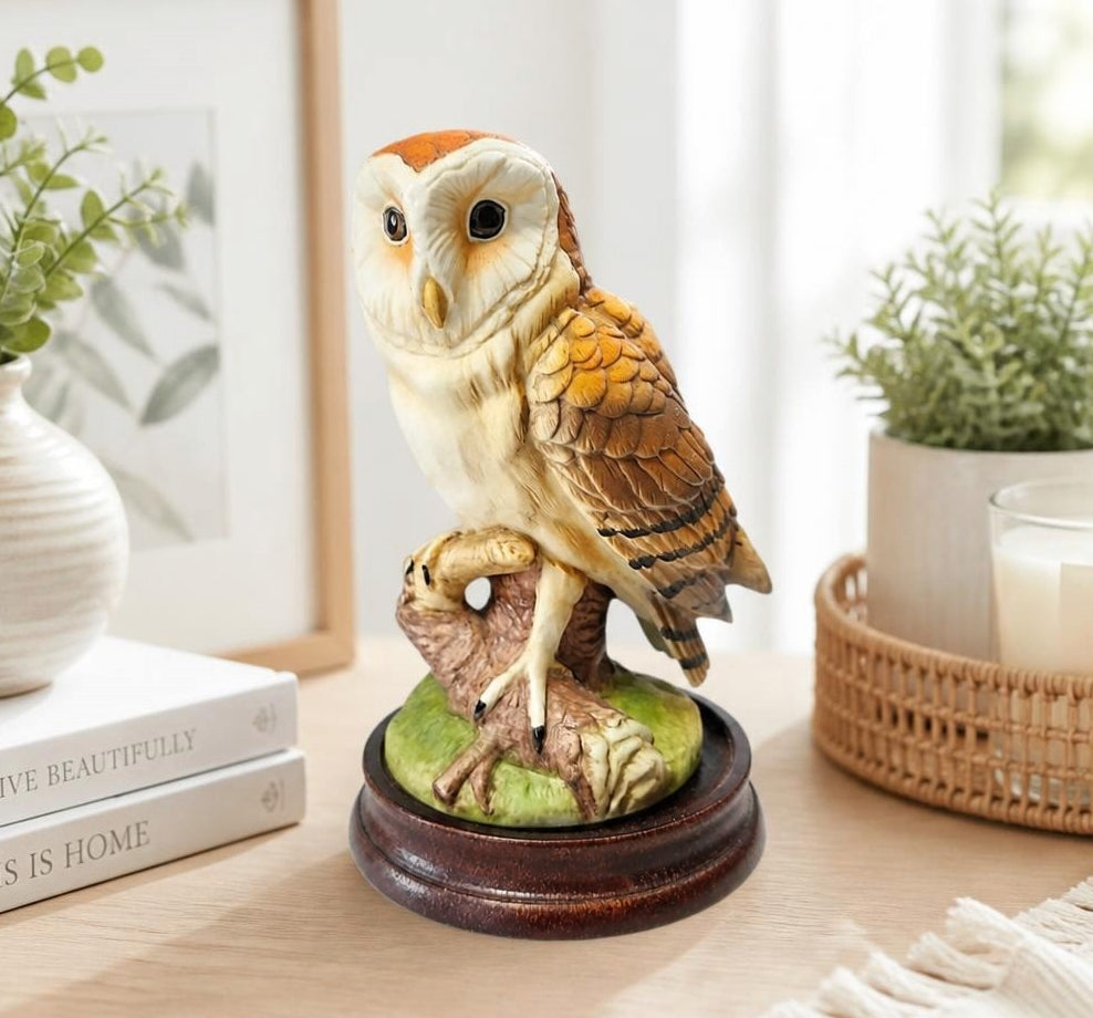 Oddly Darling Vintage Andrea by Sadek barn owl figurine with detailed feathers on a dark wooden pedestal base.