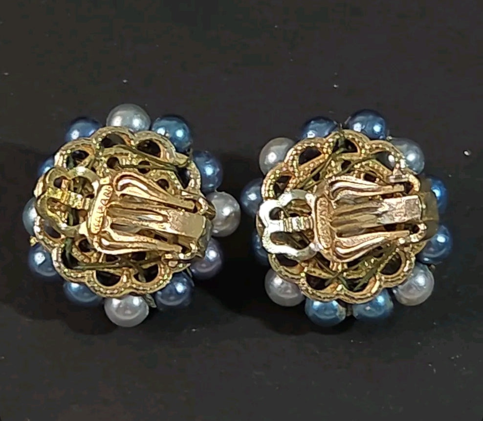 Oddly Darling Vintage mid-century clip-on earrings with blue and grey faux pearl clusters and gold-tone metal backs.