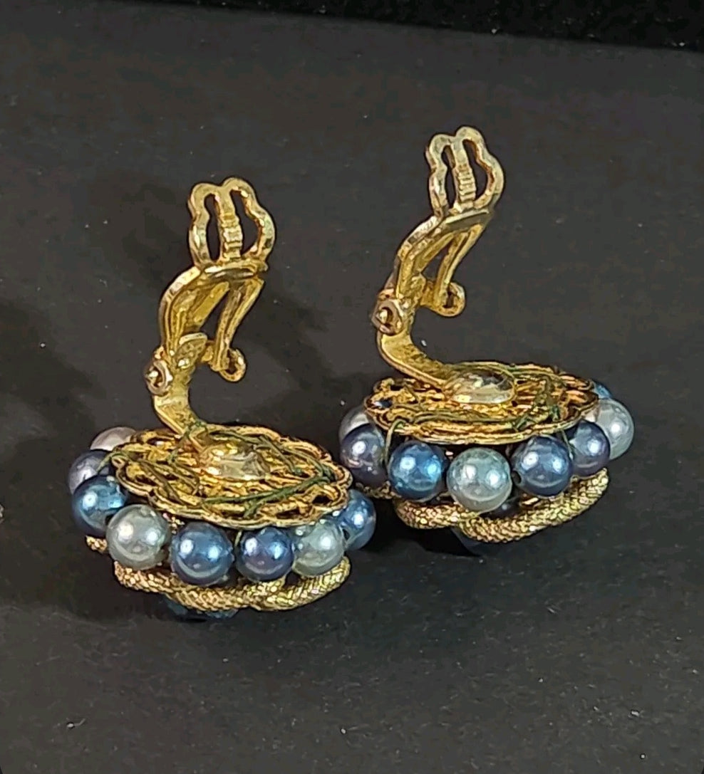 Oddly Darling Vintage mid-century clip-on earrings with blue and grey faux pearls and gold-tone metal cluster design.