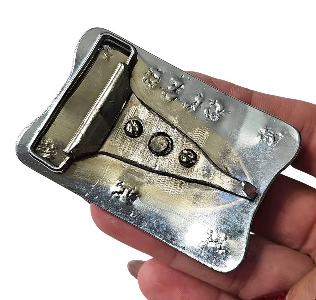 Oddly Darling Vintage silver-tone belt buckle back view showing the metal attachment mechanism and hardware