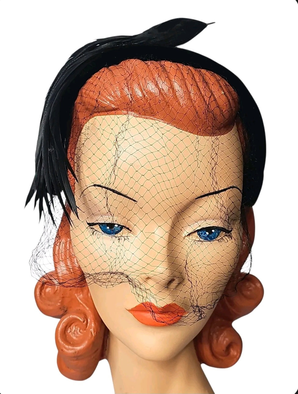 Oddly Darling Vintage black velvet fascinator headband with dark feathers and a delicate mesh netting veil on mannequin