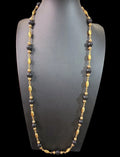 Oddly Darling Vintage long necklace with alternating polished black beads and textured gold-tone metal spacers