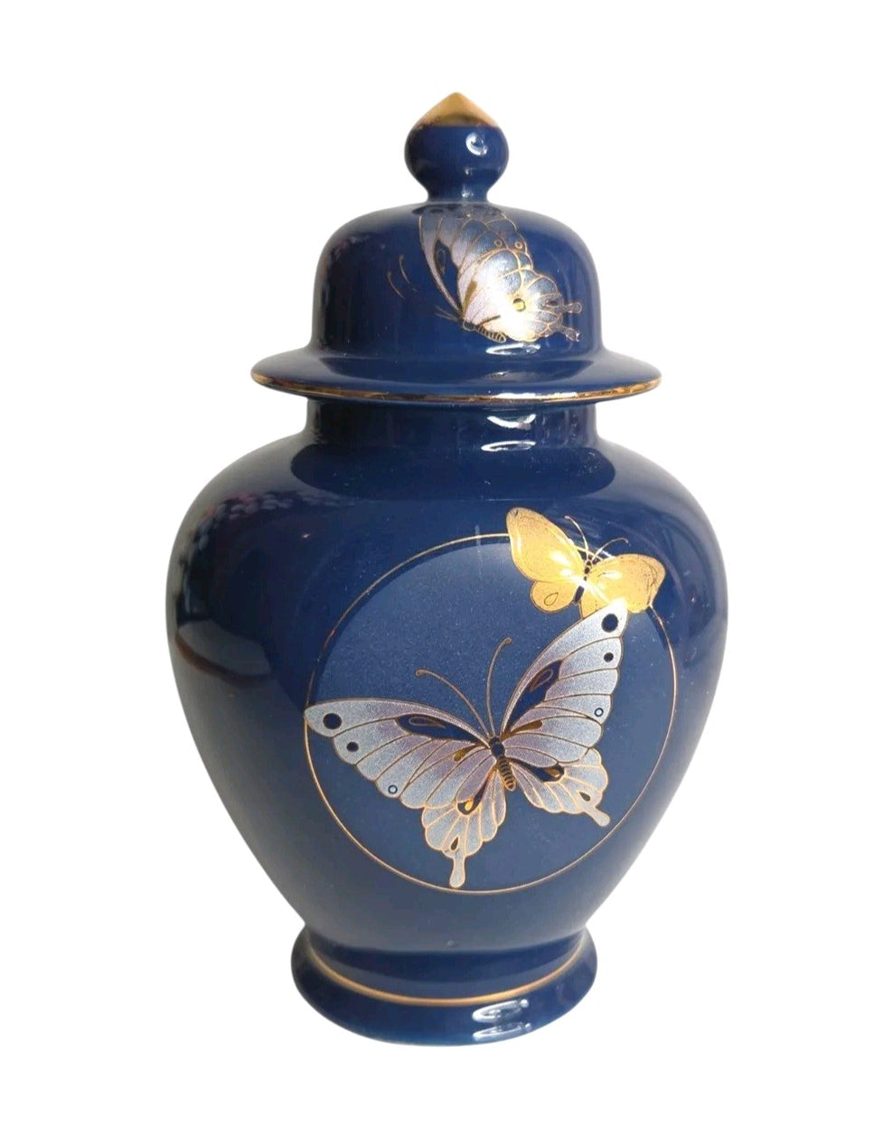 Oddly Darling Vintage cobalt blue porcelain ginger jar with hand-painted butterfly motifs and gold-toned lid finial.