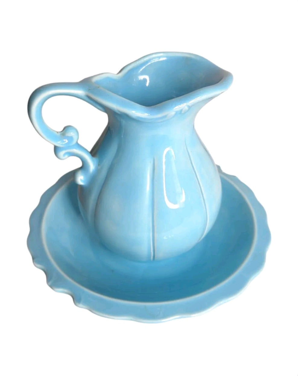 Oddly Darling Vintage sky-blue ceramic pitcher and matching scalloped basin set with a glossy finish.
