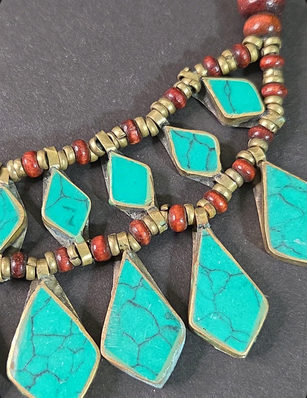 Oddly Darling Vintage bohemian layered necklace with turquoise stone inlays, wooden beads, and antiqued metal accents.