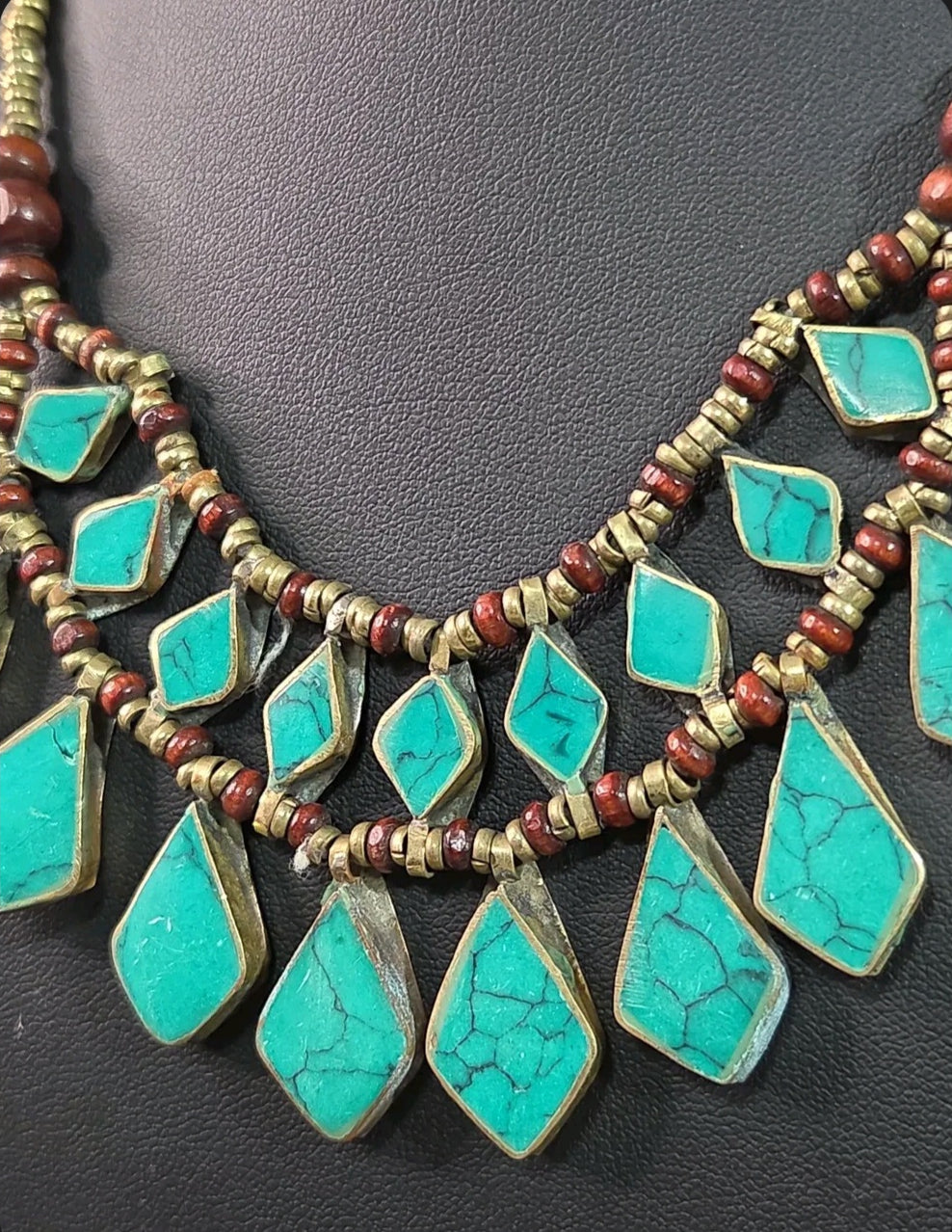 Oddly Darling Vintage bohemian layered statement necklace with turquoise stone inlays, wooden beads, and antiqued metal.