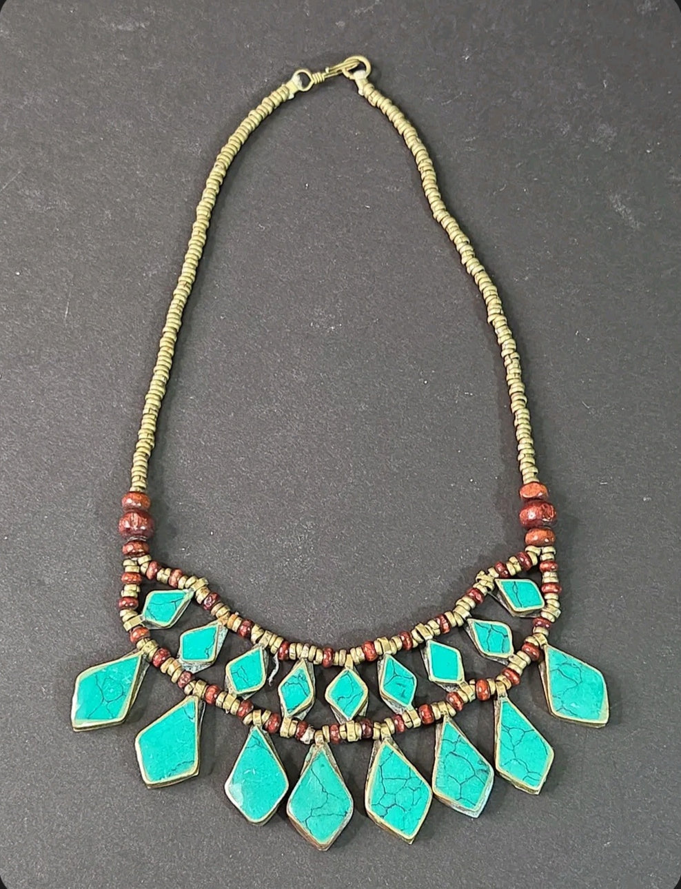 Oddly Darling Vintage bohemian statement necklace with turquoise stone inlays, wooden beads, and antiqued metal accents.
