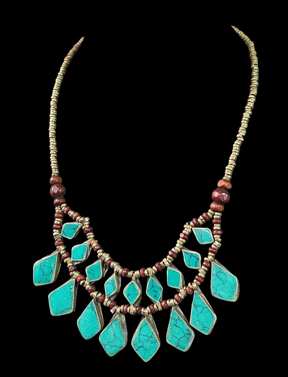 Oddly Darling Vintage bohemian layered statement necklace with turquoise stone inlays, wooden beads, and metal accents.