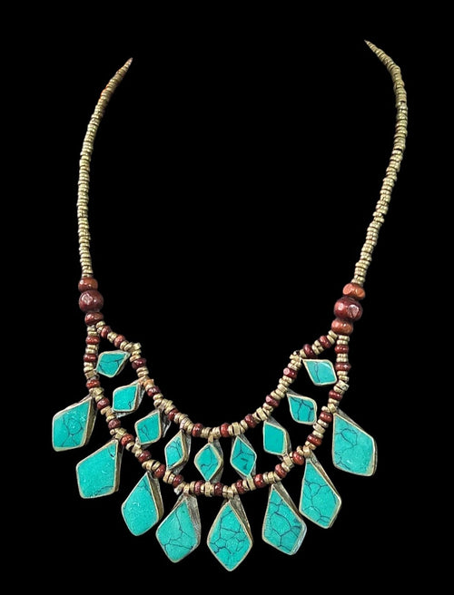 Oddly Darling Vintage bohemian layered statement necklace with turquoise stone inlays, wooden beads, and metal accents.
