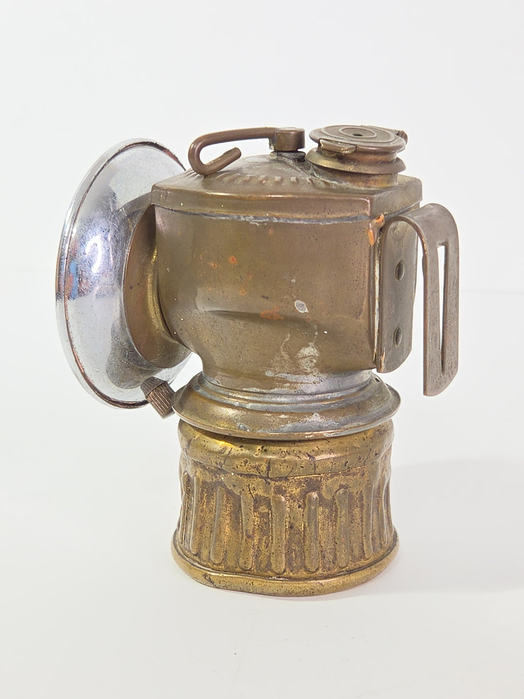 Oddly Darling Vintage antique brass carbide miner lamp with a chrome-plated reflector and weathered industrial patina.