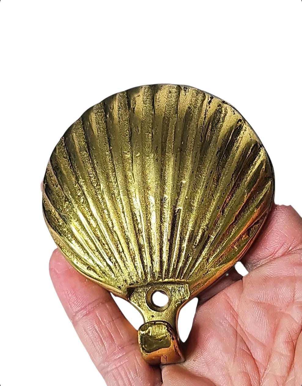 Oddly Darling Vintage brass scallop shell wall hook with a polished gold-tone finish and detailed coastal design.