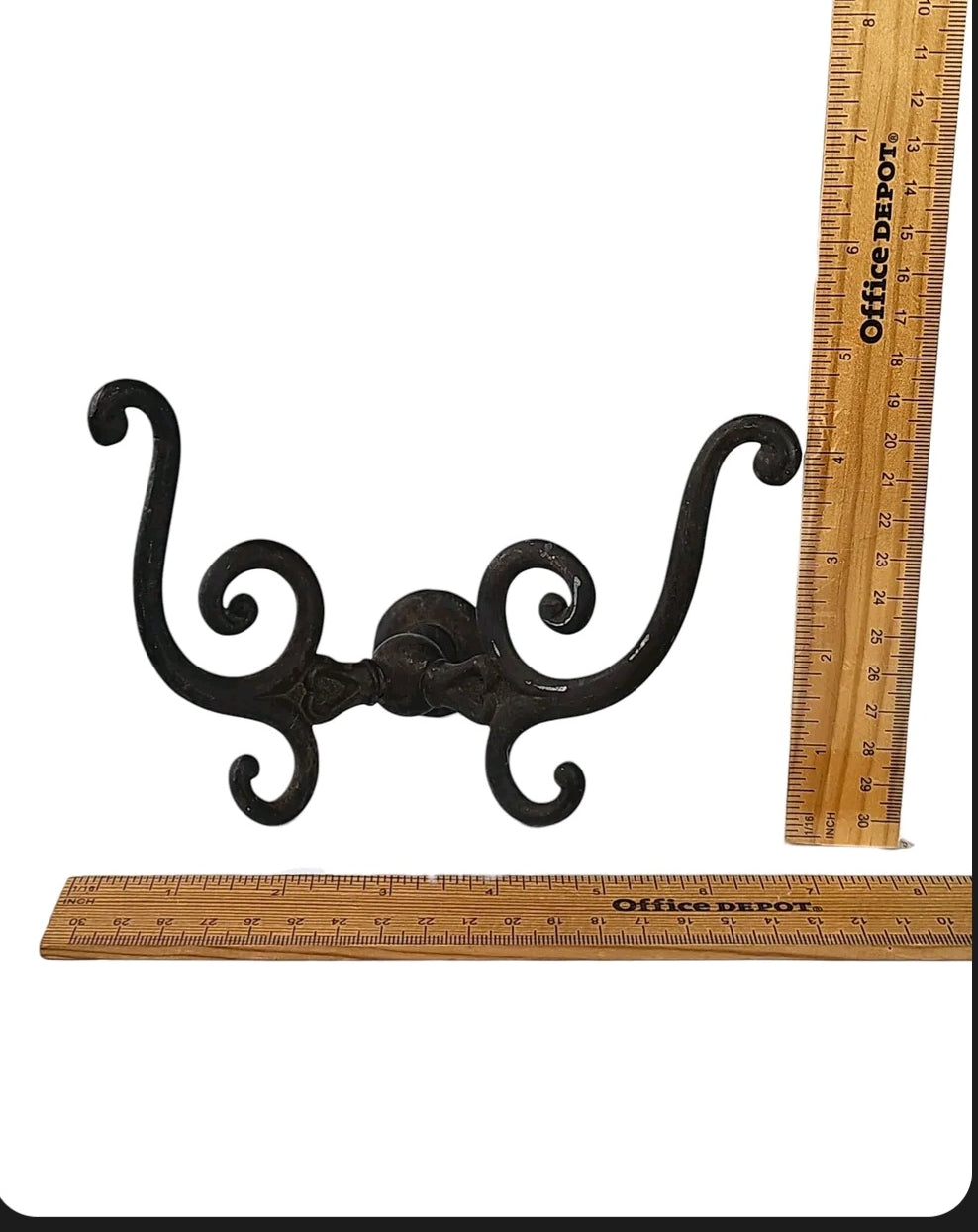 Oddly Darling Vintage ornate dark bronze metal wall hook with intricate scrollwork design for rustic home decor.