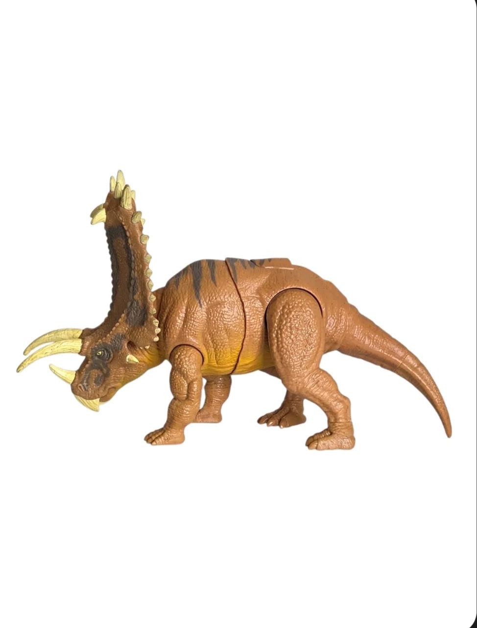 Jurassic World Pentaceratops figure showing tall frill, textured skin and movable legs