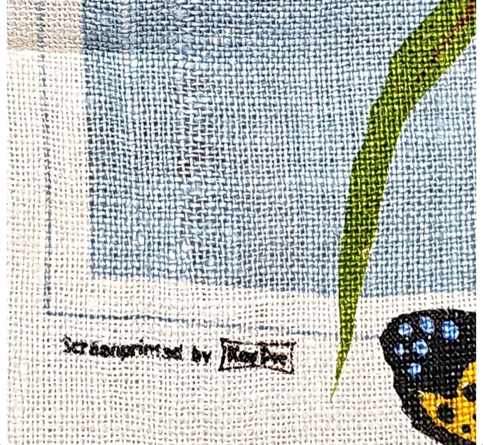 Oddly Darling Vintage linen tea towel featuring a screen-printed butterfly and green leaf on a textured fabric
