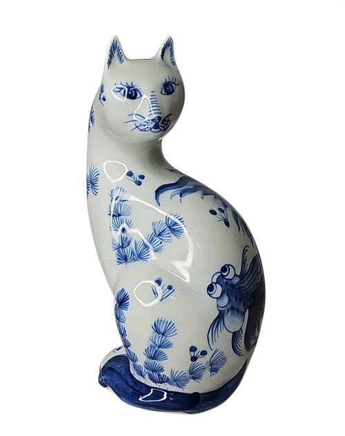 Oddly Darling Vintage ceramic cat figurine with blue and white hand-painted goldfish and botanical motifs.