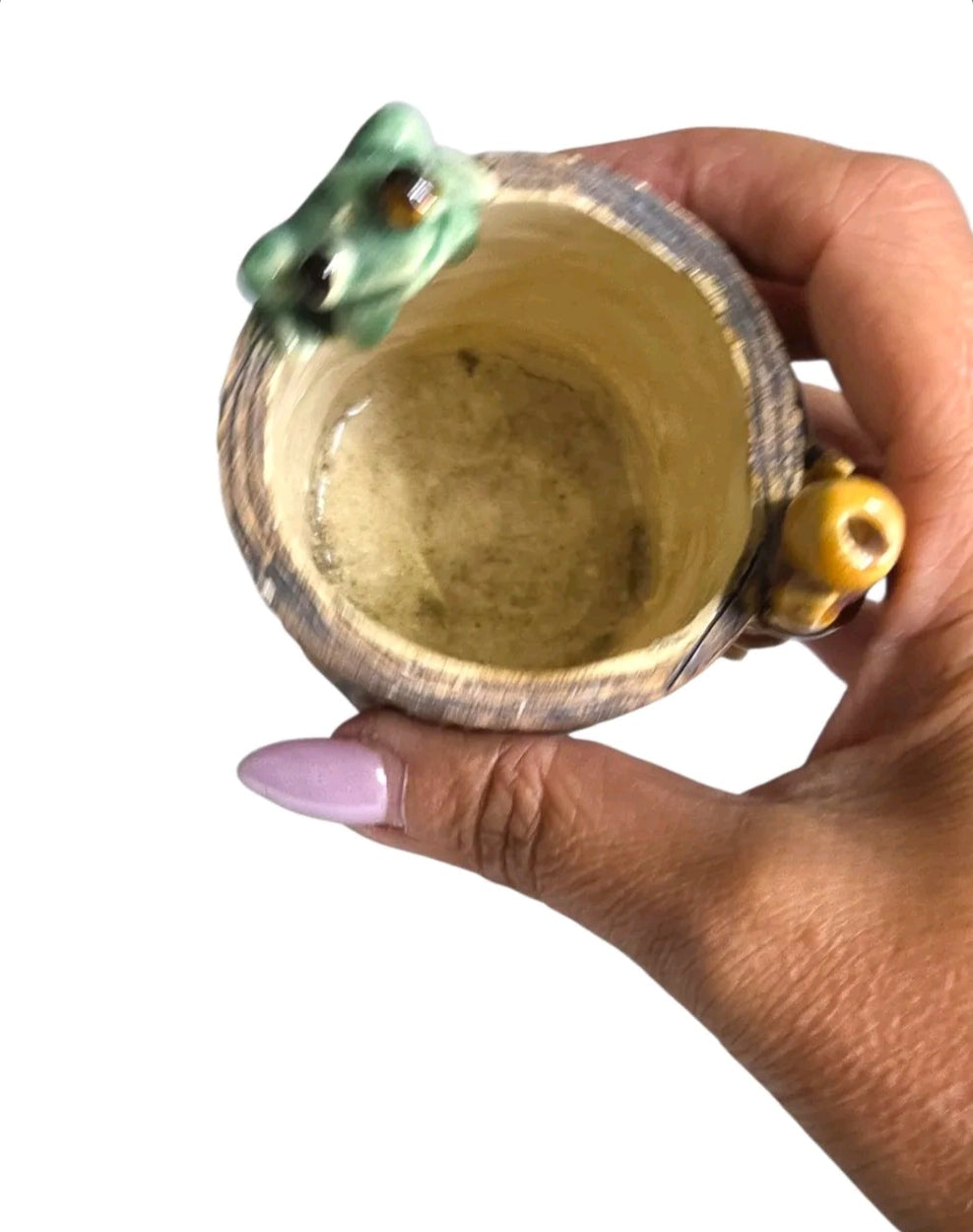 Oddly Darling Vintage handcrafted ceramic tree stump vessel with a green frog and bamboo accent held in a hand