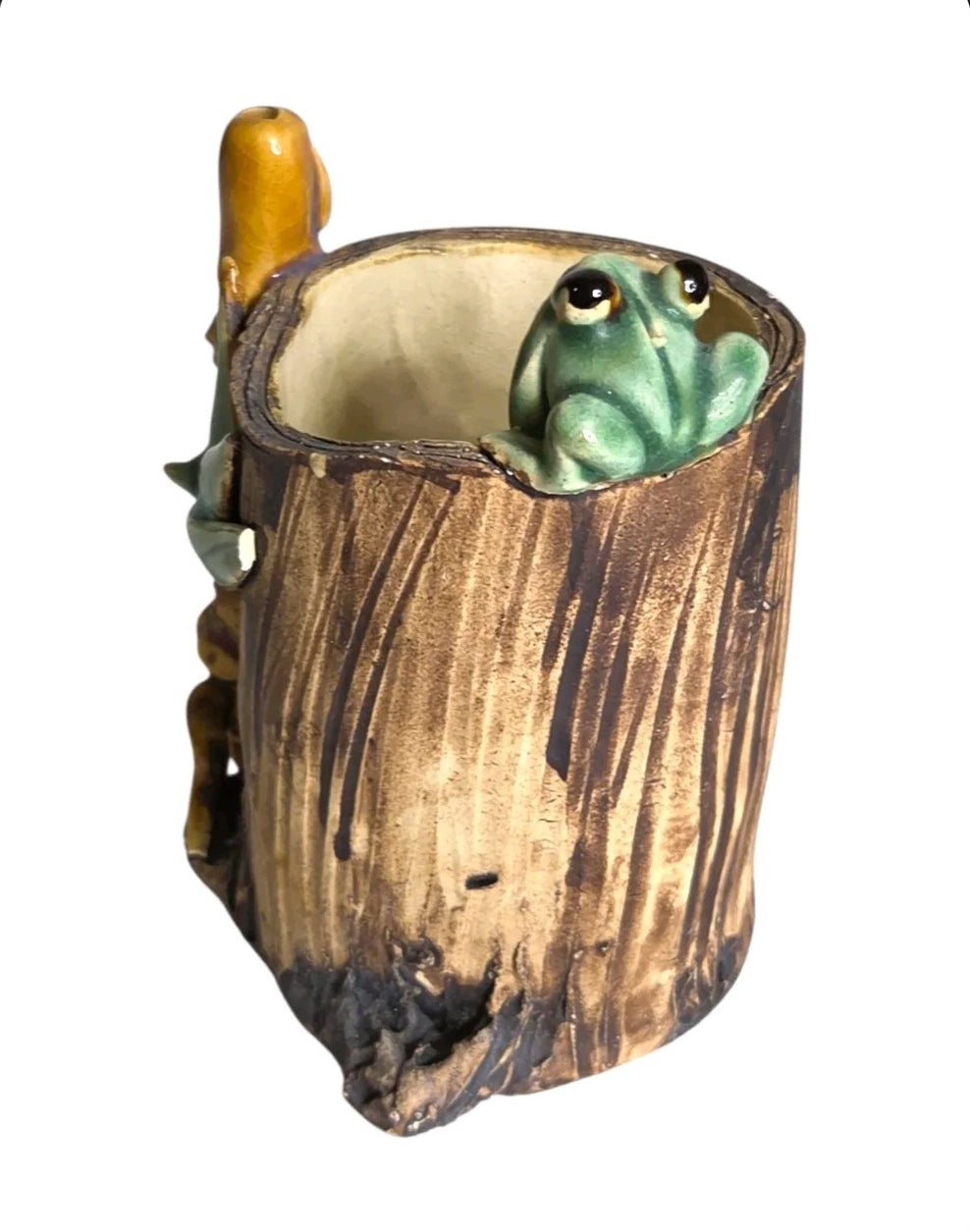 Oddly Darling Vintage handcrafted ceramic tree stump vessel with a green frog and bamboo accent for desk organization.