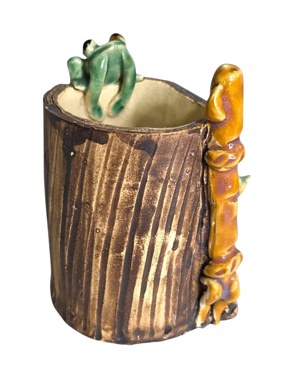 Oddly Darling Vintage handcrafted ceramic tree stump vessel with a green frog and bamboo accent for desk organization.