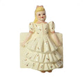 Vintage ceramic girl planter with blonde hair, pink bow and rosebud ruffle dress