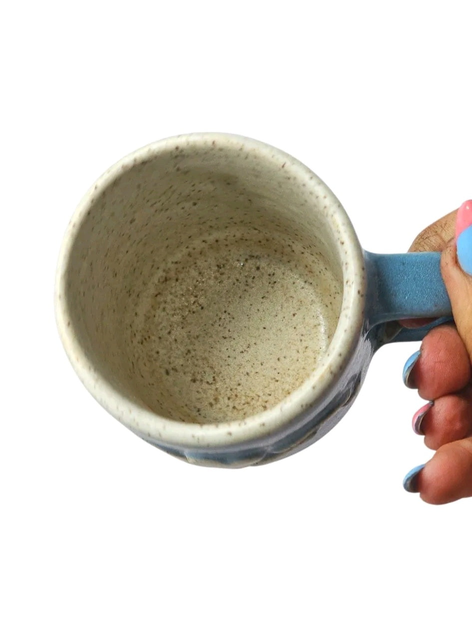 Oddly Darling Vintage handcrafted ceramic coffee mug with a blue exterior and speckled cream interior